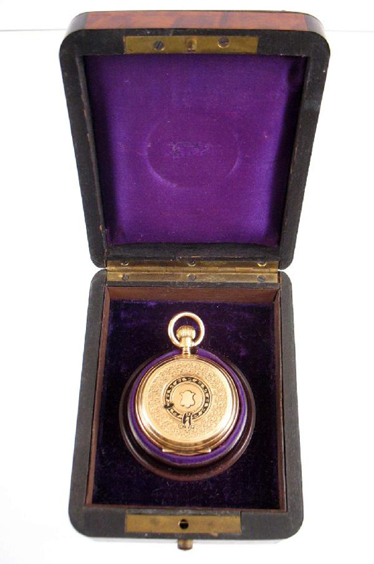 Produced in the early 1900s, this English gold enameled pocket watch is in its original burled walnut case, which is marked ‘No. 107114 H. Montandon Locle.’ It has a $300-$400 estimate. Image courtesy of Stephenson’s Auctioneers & Appraisers.