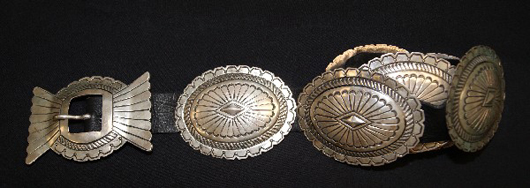Navajo Concho belt, 1970s, sterling silver, buckle is 4 1/4 inches by 2 3/4 inches, overall 45 inches long. Estimate: $800-$1,200. Image courtesy of R.G. Munn Auctions.