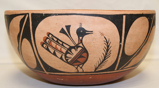 Santo Domingo pottery dough bowl, 1970s, polychrome bird design, minor chip on rim, surface rubs, 7 1/2 inches by 16 1/2 inches by 16 inches. Estimate: $1,000-$2,000. Image courtesy of R.G. Munn Auctions.
