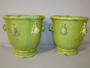 Pair of green ceramic pots, 13½ x 14 inches, provenance: J. Brown & Co., estimate $100-$300. Image courtesy The Potomack Company.