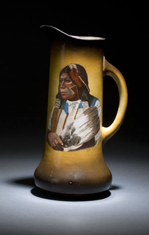 14-inch tankard with Tonskawa Indian chief, circa 1900-1920, produced by Taylor, Smith, Taylor (TST) and probably part of a lemonade set. Marked with TST monogram that was in use prior to 1920. Sold by Cowan's Auctions on May 11, 2007. Image courtesy of LiveAuctioneers.com Archive and Cowan's Auctions.