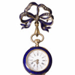 A bow-shape pin and working watch that are enameled and set with diamonds sold for $863 at a Cottone auction in Geneseo, N.Y. It is marked "J. Laforge Besacon."