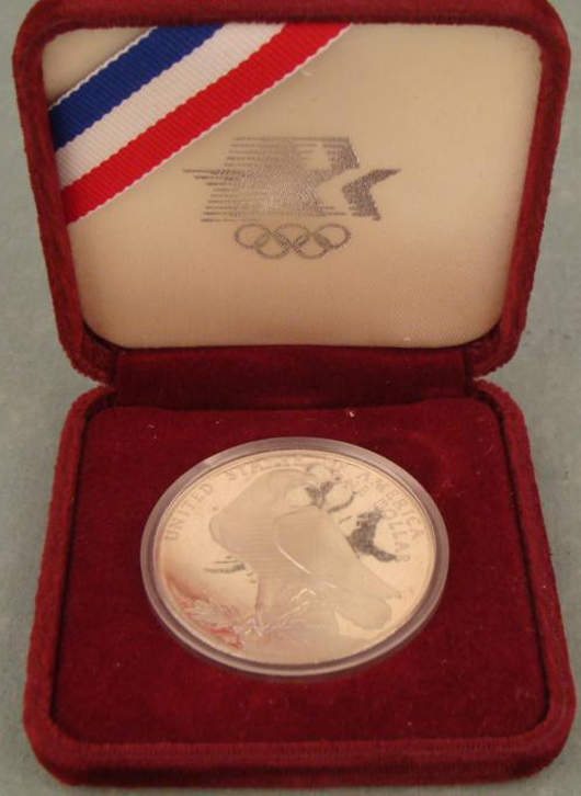 1984 Olympics Proof Commemorative Dollar  Est. $20-$30. Image courtesy of Universal Live.