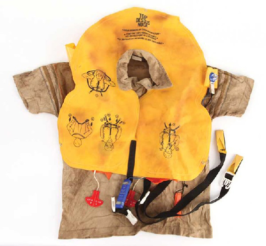 Walt's distressed shirt & life jacket worn on the raft. Estimate $200 - $300. Image courtesy LiveAuctioneers.com and Profiles in History. 