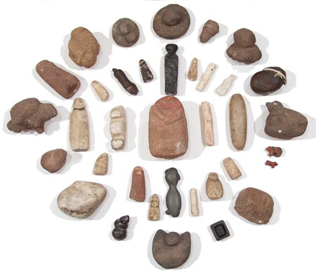 This hand-carved stone fetish collection numbers 37 pieces. With documentation and descriptions, the Zuni, Hopi and other Pueblo fetish carvings from the early 1900s are estimated at $25,000-$50,000. Image courtesy of Allard Auctions Inc.