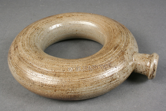 The value of this salt-glaze stoneware ring bottle was enhanced by the stamped mark of North Carolina potter W.H. Hancock (1845-1924). The example in excellent condition brought $2,384. Image courtesy Case Auctions, Knoxville, Tenn.