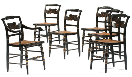 An armchair and five side chairs comprise this 1950s set of Hitchcock chairs. The estimate is set at $300-$500. Image courtesy of Cowan’s Auctions Inc.