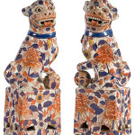 An ink-stamped six-character mark is on bottom of these 20th-century Chinese foo dogs. The 15 1/2-inch-tall figures have a $75-$150 estimate. Image courtesy of Cowan’s Auctions Inc.