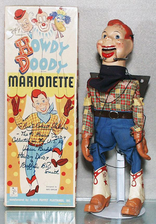 Buffalo Bob Smith, host of the Howdy Doody show, inscribed and signed the box of this marionette depicting Howdy. The 15-inch-tall figure has a $100-$200 estimate. Image courtesy of Lloyd Ralston Gallery