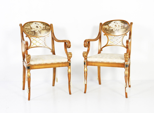 Pair of Empire-style armchairs with painted backs and scrolled arms (estimate: $600-$650). Image courtesy of Morton Kuehnert Auctioneers & Appraisers.