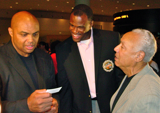 "You're kiddin' me. That cannot POSSIBLY be my golf score!" said Charles Barkley (left), who was being set up for a joke by (center) Hall of Famer David "the Admiral" Robinson and (right) Lenny Wilkens, former president of Basketball Operations for the Seattle SuperSonics.
