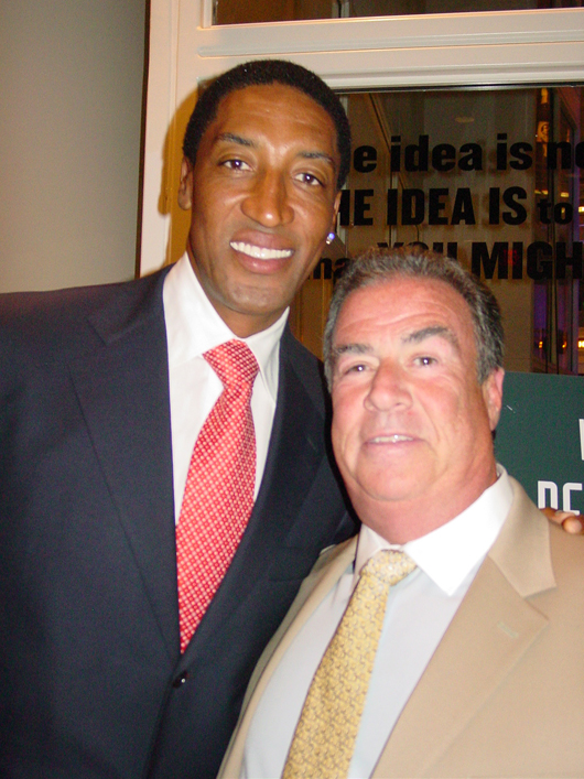 This was the Hall of Fame Induction year for seven-time NBA All-Star Scottie Pippen, one of only four Chicago Bulls players to have his number retired. At right: Grey Flannel Auctions' owner, Richard E. Russek. Photo copyright Catherine Saunders-Watson.