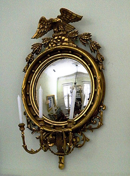 Federal three-arm girandole 19th-century mirror in a gilt wood and gesso frame with convex mirror. Image courtesy The Specialists of the South Inc.