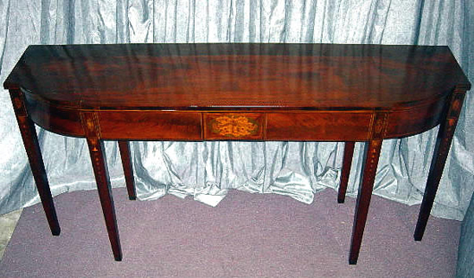Mahogany 19th-century inlaid hunt board table with secret compartment. Image courtesy The Specialists of the South Inc.