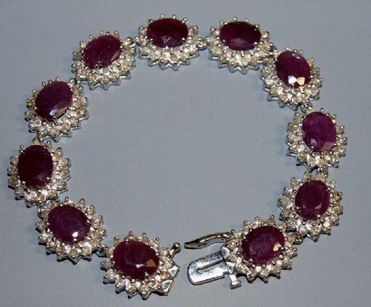 Eleven faceted rubies weighing approximately 27.50 carats adorn this 14K white gold bracelet, which has a $4,000-$6,000 estimate. Image courtesy of Austin Auction Gallery.