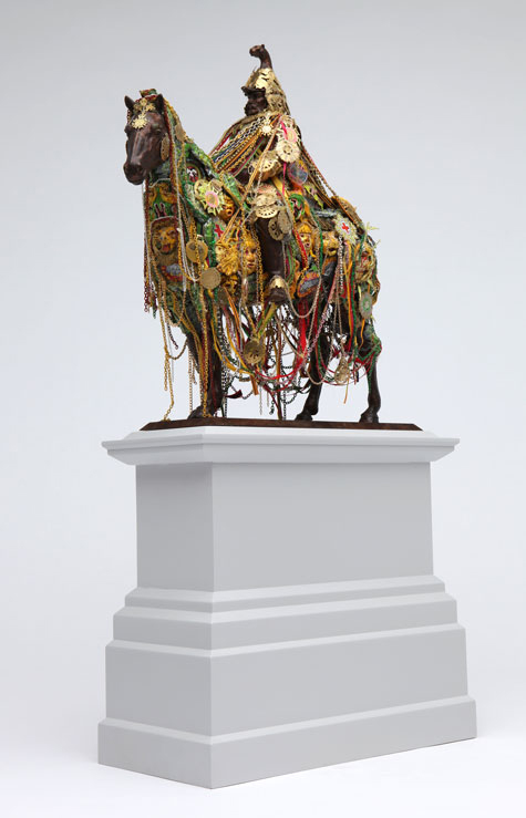 Hew Locke, Sikandar, model of proposed sculpture of statue replicating an existing one of Field Marshall, Sir George White (1835-1912), adorned with horse brasses, charms, medals, sabers, jewels and other fetishes. Image courtesy of the artist and Greater London Authority. All rights reserved.