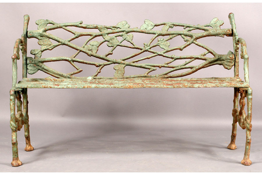 The rustic look in a more durable material, this cast-iron "twig" bench is perfect for an all-weather setting. The example brought $2,640 at auction in April. Image courtesy of Kamelot Auctions.