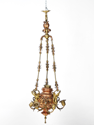 Brass and copper eight-light chandelier, 53 inches long by 19 inches wide by 19 inches deep. Estimate: $250-$300. Image courtesy of Morton Kuehnert Auctioneers & Appraisers.