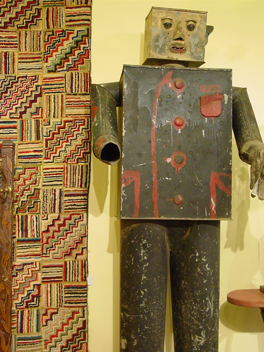Standing possibly 8ft. tall, a painted metal robot figure was once the mascot of a Massachusetts hardware store. Available for $1,800 from Ferguson & D'Arruda, Providence, R.I. Photo copyright Catherine Saunders-Watson.