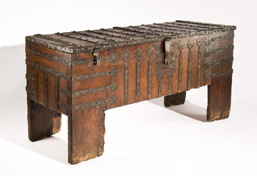 This 16th-century iron-bound oak chest known as a stollentruhe is from the Westphalia region of Germany. The rare piece carries a $20,000-$30,000 estimate. Image courtesy of Dallas Auction Gallery
