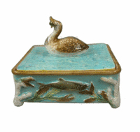A duck with a fish in its mouth is the handle on the lid of this majolica sardine box by George Jones, a famous English potter. Although repaired, it sold for $950 at a Michael Strawser majolica auction in Wolcottville, Ind.