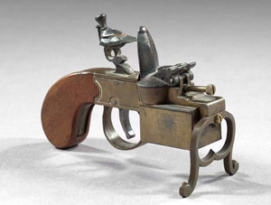 Gun-shape and other novelty cigarette lighters made before 1970, like this Alfred Dunhill tinder pistol example, patented 1897, will not be affected by the pending law in Massachusetts. This lighter sold for $700 plus b.p. at New Orleans Auction Galleries' Nov. 20, 2005 sale. Image courtesy LiveAuctioneers.com Archive and NOAG.