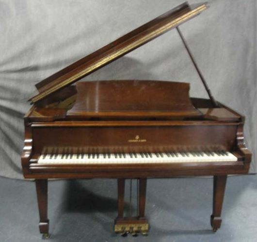 Steinway mahogany baby grand piano, estimate $6,000-$9,000. Clarke Auctions image.