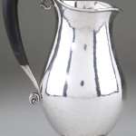Georg Jensen sterling pitcher with ebony handle and ovoid body, engraved Christmas 1928. Image courtesy of Leland Little Auction & Estate Sales Ltd.