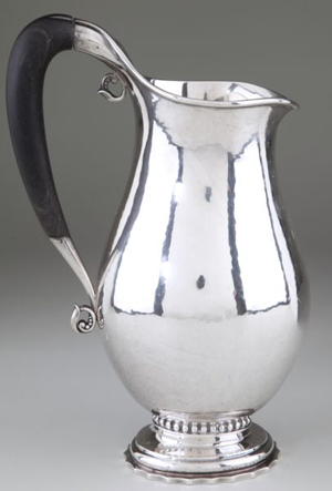 Georg Jensen sterling pitcher with ebony handle and ovoid body, engraved Christmas 1928. Image courtesy of Leland Little Auction & Estate Sales Ltd.