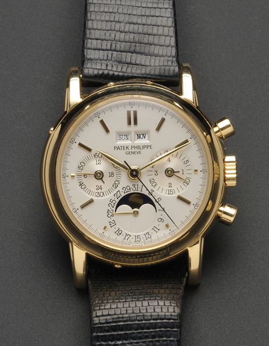 Patek Philippe 18kt gold perpetual calendar chronograph wristwatch with moon phase display, signed case, dial, movement, bracelet and buckle, with original box and papers. Estimate $50,000-$70,000. Image courtesy of Skinner Inc.