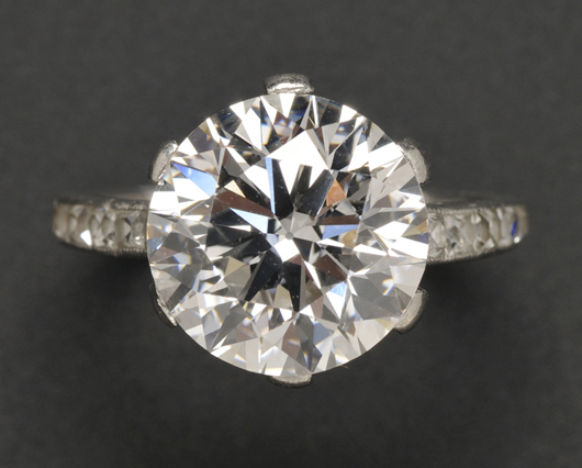 Art Deco platinum and diamond solitaire, Tiffany & Co., set with a circular-cut diamond weighing 5.36 carats, fancy square-cut diamond shoulders. Accompanied by GIA report stating that the diamond is F color, VS1 clarity, with no fluorescence. Estimate $75,000-$100,000. Image courtesy of Skinner Inc.