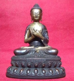 Sino-Tibetan bronze figure of Buddha, Qianlong seven-character mark and of the period (1736-1795), approximately 12 1/2 inches high, est. $80,000-$100,000. Image courtesy of Time & Again Auction Galleries.