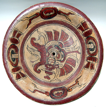 A bearded dragon or war serpent is pictured in the center of this Maya plate from the Peten area of Guatemala, circa A.D. 600-900. The restored 12 1/4-inch plate has a $2,000-$3,000 estimate. Image courtesy of Ancient Resource LLC.
