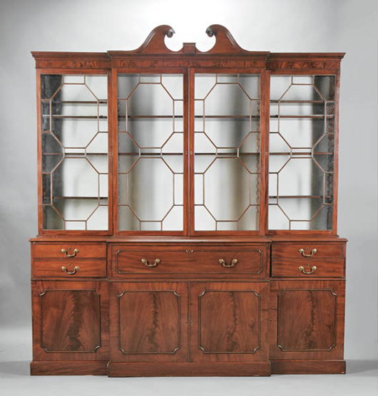 George III mahogany breakfront bookcase, circa 1780, height 107 inches, width 96 inches, depth 23 1/2 inches, est. $20,000-$30,000. Image courtesy of Neal Auction Co.