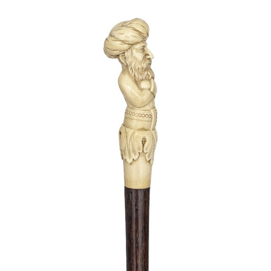 Ivory mullah English c, late 18th century, malacca shaft, chased silver collar and bronze ferrule, est. $2,000-$3,000. Image courtesy of Kimball M. Sterling Inc.