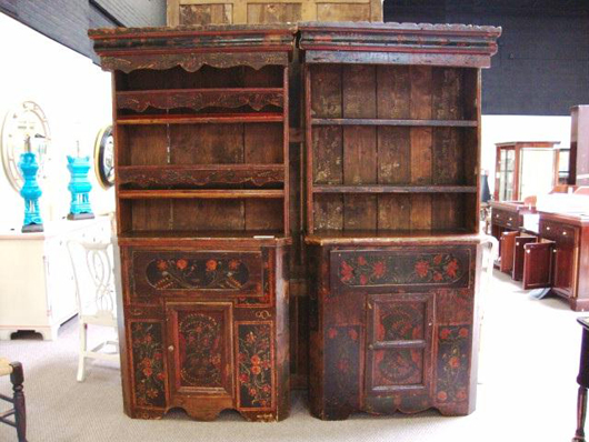 Pair of beautiful and monumental antique Austrian hand-painted hutches (est. $4,000-$6,000). Image courtesy of Vintage Galleries.
