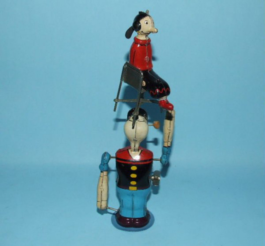 Marx Popeye Juggling Olive Oyl tinplate windup, 1950s, Japan. Estimate $1,200-$1,800. Image courtesy Toys of Times Past and LiveAuctioneers.com.