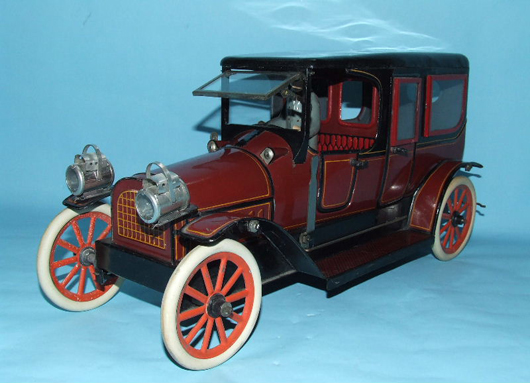 Karl Bub (Germany) tinplate clockwork limousine, 1908, 14 inches long, near mint. Estimate $4,000-$6,000. Image courtesy Toys of Times Past and LiveAuctioneers.com.