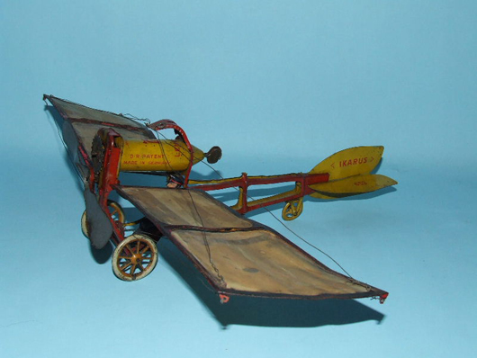 Lehmann (Germany) Ikarus airplane, 1914, complete and all original with paper wings and tin pilot. Estimate $3,500-$5,000. Image courtesy Toys of Times Past and LiveAuctioneers.com.