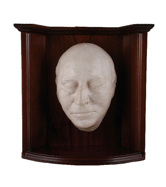 Death mask of Irish poet and novelist Patrick Kavanagh by Seamus Murphy (Irish, 1907-1975), dated 1967, mounted on a mahogany inverted cavetto plaque, one of three in existence, 10 3/4 inches high, est. $3,977-$6,629. Image courtesy of Sheppards Irish Auction House.
