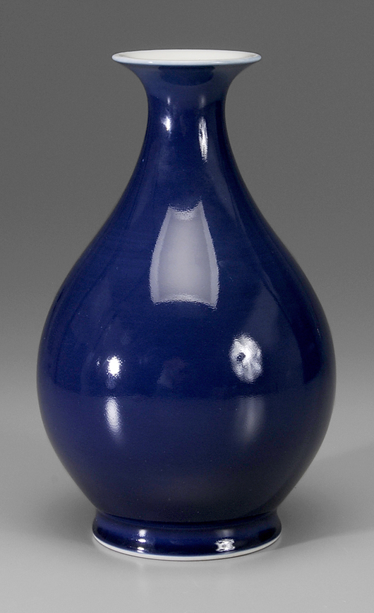 On the base of this 11 1/2-inch cobalt blue glazed Chinese vase that brought $23,300, is a six-character Guangxu mark. This vase brought $25,300. Image courtesy of Brunk Auctions.