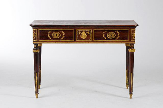 Made in the 20th century, this Empire-style rosewood and gilt bronze writing table is stamped ‘FUNDACAO, R.E.S.S. and has a $2,000-$4,000 estimate. Image courtesy of Gray’s Auctioneers.