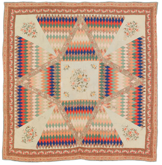 Unusual star variant chintz quilt, late 19th century, with center and corner crewel needlework floral panels with triple chintz border, 75 inches by 78 inches, est. $500-$1,000. Image courtesy of Pook & Pook Inc.