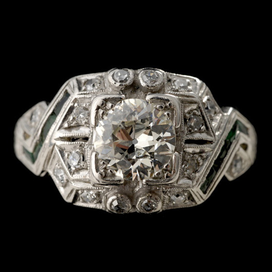 Diamond, platinum ring, approximately 0.85 carat, accented by 16 single-cut diamonds, weighing a total of approximately 0.16 carat, eight caliber-cut green stones, estimate: $800-$1,200. Image courtesy of Michaan’s Auctions.