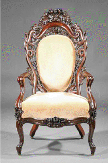 This important rococo carved and laminated rosewood armchair, attributed to John Henry Belter, New York, in the pattern known as Fountain Elms, realized $17,080. Image courtesy of Neal Auction Co.