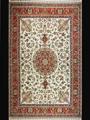 As expected, this large Tabriz Persian rug made in the early 1990s sold for $26,000. Image courtesy of Morton Kuehnert Auctioneers & Appraisers.