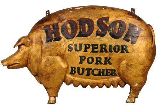 Wooden Hodson Superior Pork Butcher pig-shape trade sign, late 19th century, estimate $8,000-$12,000. Morphy Auctions image.