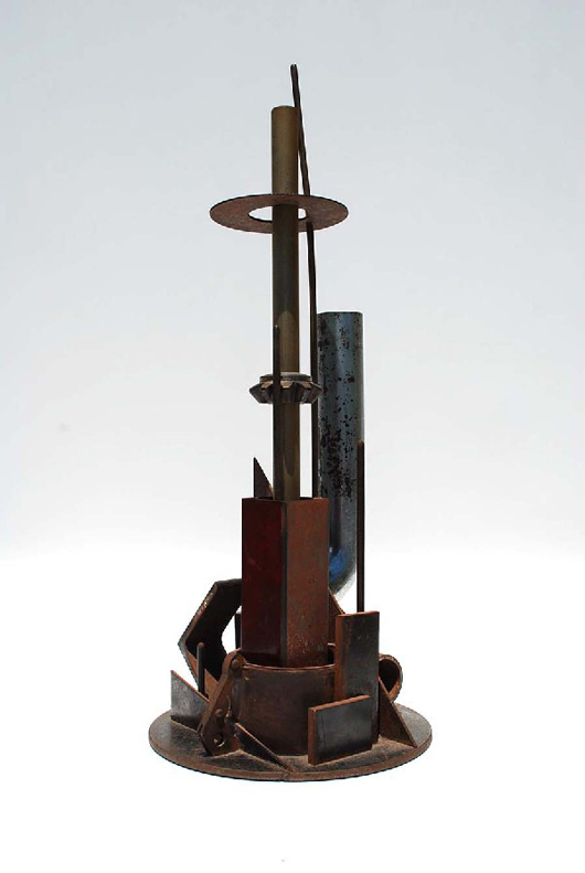 Abstract sculpture by Tim Holmes (American, 1955- ), various metals, 19 1/2 inches high, 8 inches diameter, estimate $300-$400. Image courtesy of Palm Beach Modern Auctions.
