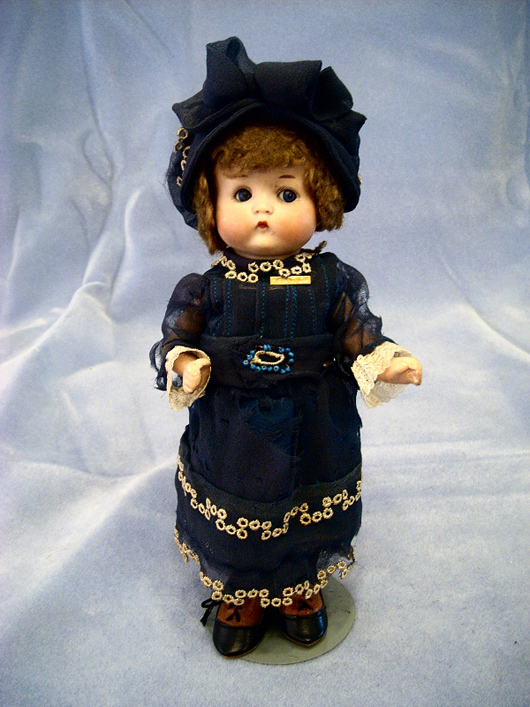 German 9-inch Armand Marseille “Just Me” doll with closed mouth and bisque head. Image courtesy of Browne Auction Specialists.