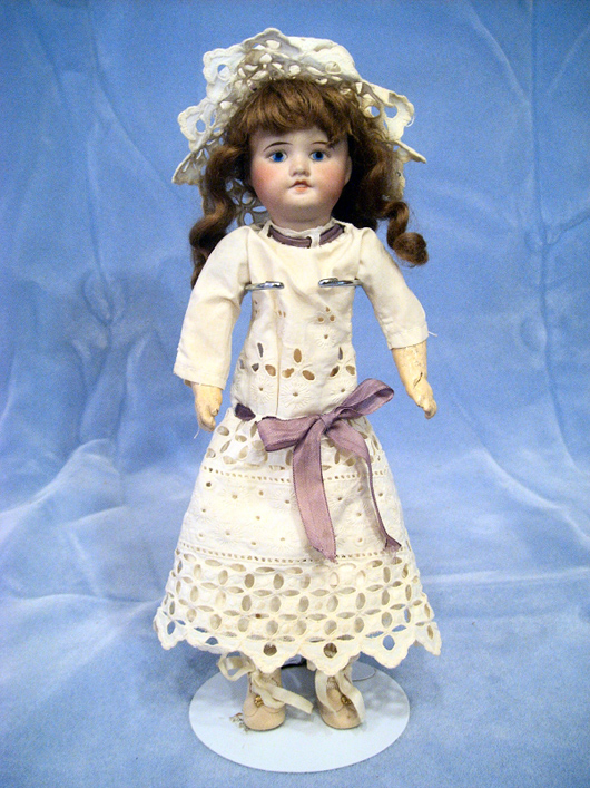 Gorgeous 12-inch SFBJ French doll with composition body and bisque head. Image courtesy of Browne Auction Specialists.